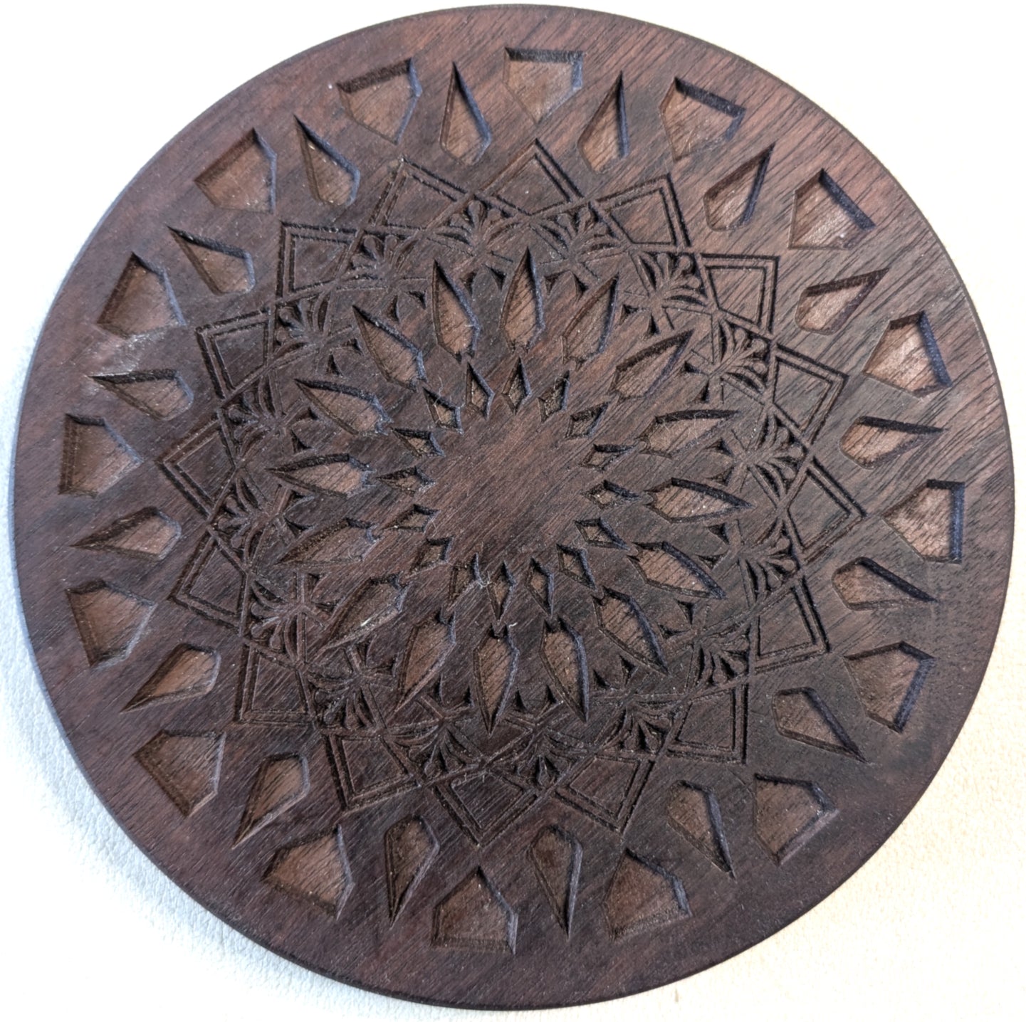 Trivet, small - Geometric Starburst pattern in walnut